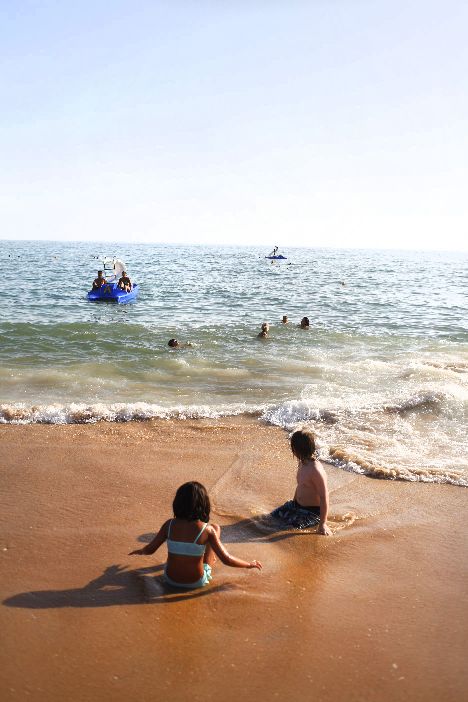 Kids Playing In Quarteira Beach